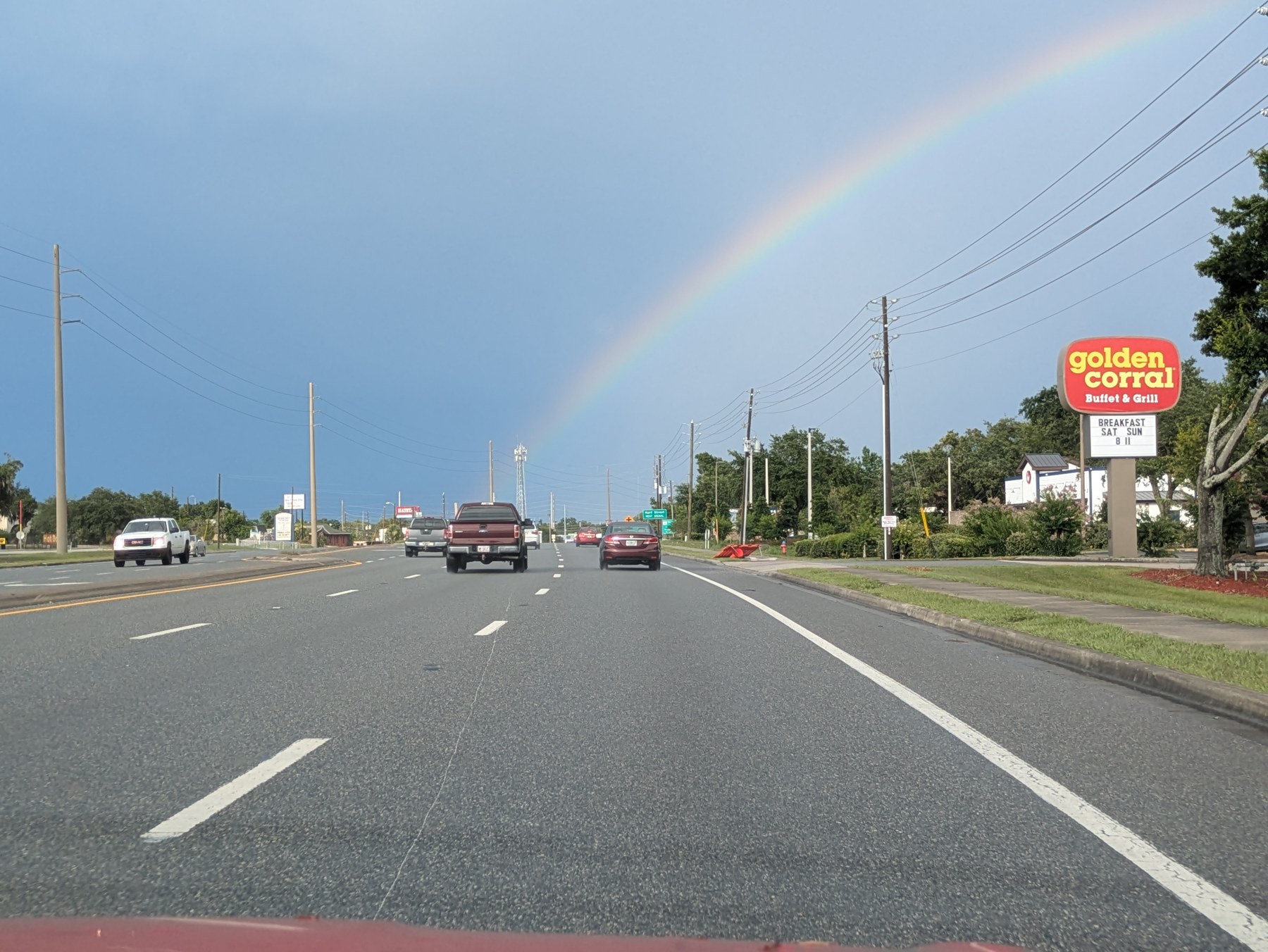 Rainbow over a roadway