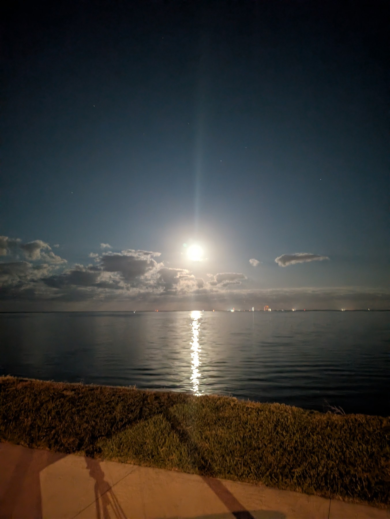 Nighttime launch over the water